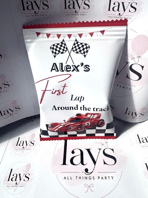 Race car themed first birthday chip bag reading Alex's First Lap Around the track